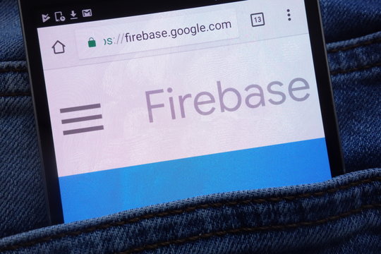 KONSKIE, POLAND - JUNE 11, 2018: Google Firebase website  displayed on smartphone hidden in jeans pocket