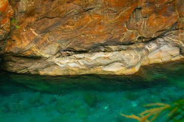 Taroko Pavilion Scenic Area, Hualien, Taiwan, with colorful rock walls and turquoise streams in Shakayu Creek