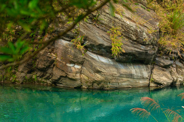 Taroko Pavilion Scenic Area, Hualien, Taiwan, with colorful rock walls and turquoise streams in Shakayu Creek