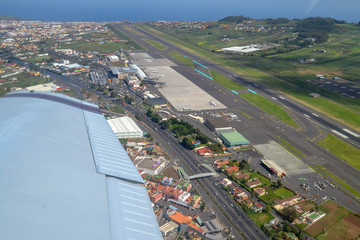 Tenerife,Canary Islands, Spain - April 17, 2015: Aerial view of Tenerife North Airport (GCXO) captured from the Piper PA-28 airplane