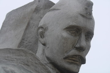 monument to a Soviet soldier in uniform