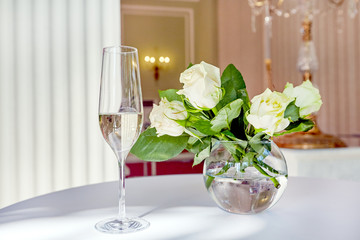 Table decor with flowers and wine glass