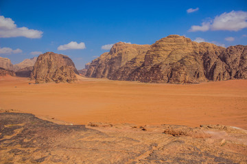 Fototapeta na wymiar desert landscape top view point of rock sand valley and rocky mountain ridge vivid colorful Jordan Middle East region