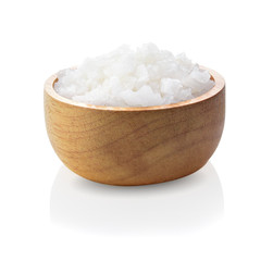 salt in a wooden bowl isolated on white background