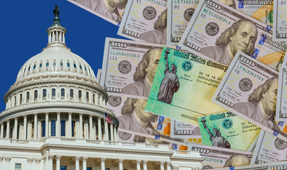 Washington DC Capitol dome with finishing touches on a stimulus bill USA dollar cash banknote on...
