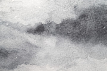 Grey abstract watercolor background. Painting on paper