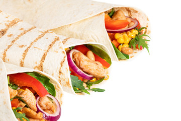 Mexican burrito with chicken, pepper and beans  isolated on white background