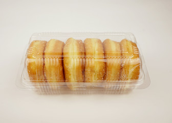 Isolated brown donuts on a white background.