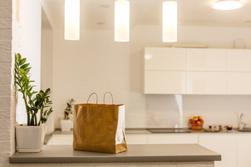 Fast food packaging set. Paper food box, brown paper bag on the table