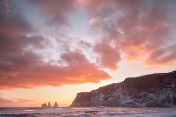 Iceland in winter. Beautiful colorful sunset on the beach.