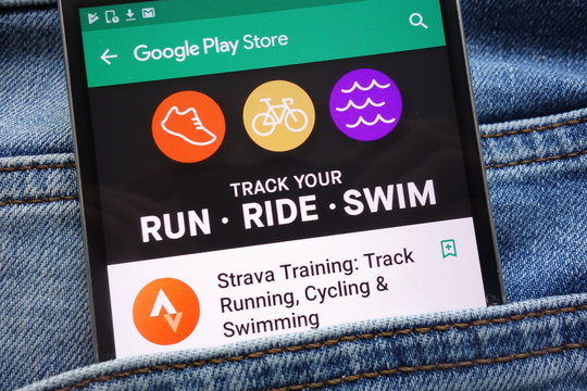 KONSKIE, POLAND - JUNE 09, 2018: Strava Training: Track Running, Cycling and Swimming app on Google Play Store website displayed on smartphone