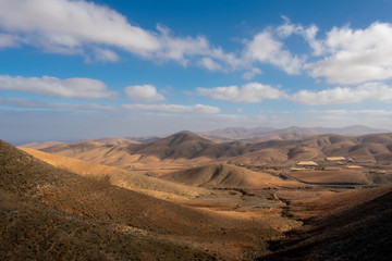 Fototapeta na wymiar Fuerteventura, Canary Islands, Spain. Beautiful landscape of mountains, beach and coast of Atlantic Ocean 
