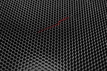honeycombs - the texture is dark, with a defect in the center