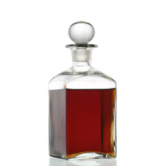 Bottle of whisky isolated on white