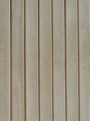  Background from wooden boards, beige color. Wood texture. Planks are vertical. For the text.