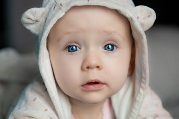 Portrait of cute child in hood