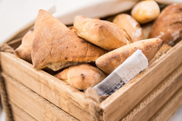 Fresh bread in a basket. Food concept.