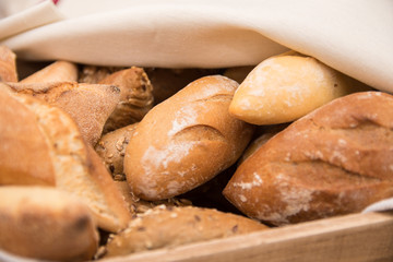 Variety of fresh bread in a basket. Food concept.