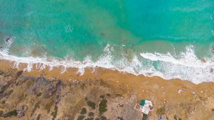 Energy passing through turquoise water in the Mediterranean Sea. Top view. Sea and waves. Power of water