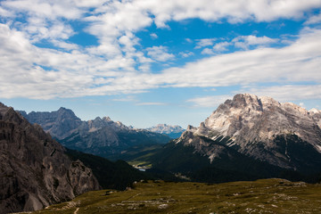 Panorama of Dolomites mountains with clouds. National Park Tre Cime di Lavaredo, Alps mountain chain, Trentino Alto Adige region, Sudtirol, Italy