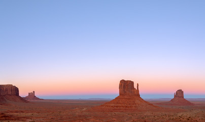 Beautiful sunset over famous Buttes of Monument Valley on the border between Arizona and Utah, USA