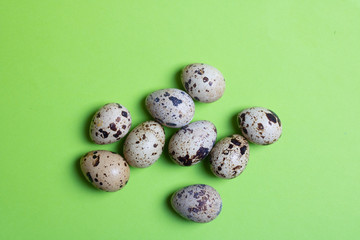 background with small quail eggs on paper. Eco products. Horizontal format