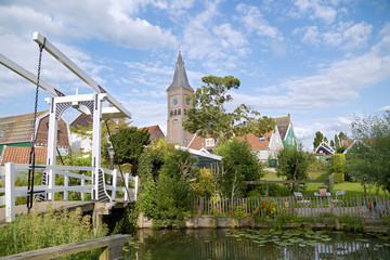 Typical Dutch village scene with wooden houses on the island of Marken in the Netherlands, Holland