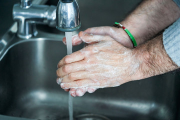 Washing hands rubbing with soap man for corona virus prevention - 333240471