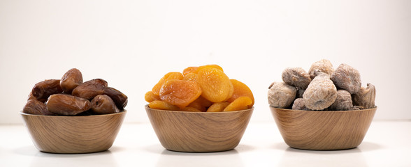 Dried fruit composition on white background
