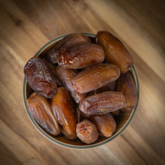 Dried fruit composition on wood background