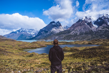 Man looking at beautiful mountains