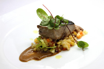 Palamita escalope with Altamura bread salad, monkfish liver sauce and black garlic yogurt