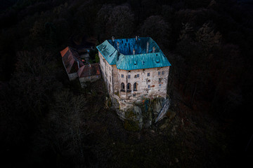 Houska Castle is an early Gothic castle. It is one of the best preserved castles of the period. Notable features include a predominantly gothic chapel, green chamber with late-gothic paintings.