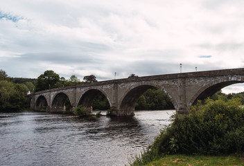 Fototapeta na wymiar Bridge throughout river