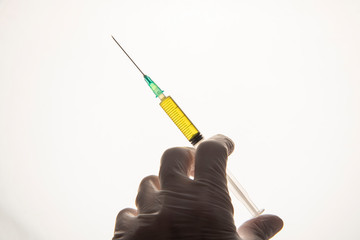 corona virus vaccine syringe on hand isolated
