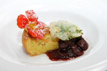 Burrata cake and saffron courgette flowers with Negroamaro cherry jam, flower tempura and nasturtium leaves