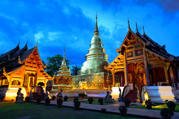 Fototapeta premium Phra Sing temple,landmark for tourist at Chiang Mai,Thailand.Most favorite landmark for travel Phra Sing temple at night scene.