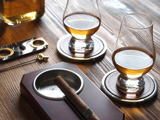 Two glencairn glasses of whisky