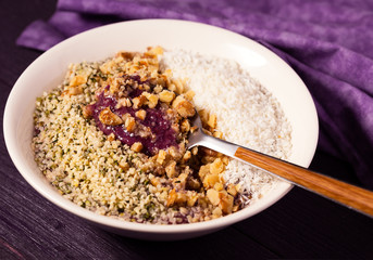 Smoothie Bowl Topped with Coconut, Walnuts and Hemp Seed