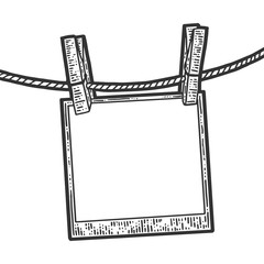 Sketch photo dries on a clothesline. Apparel print design. Scratch board imitation. Black and white hand image.