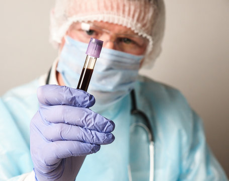 Medical laboratory specialist with a test tube
