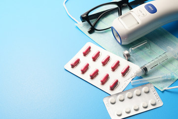 composition of medical objects on color desk. coronavirus covid 19. selective focus