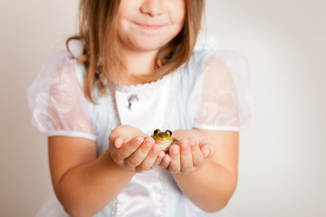 Happy Princess Girl Holding a Frog, Fairy Tale Magic