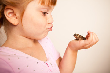 Little Princess Girl Kissing a Toad, Fairy Tale Magic