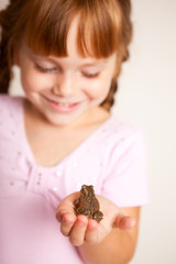 Happy Princess Girl Holding a Toad, Fairy Tale Magic
