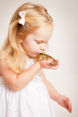 Little Princess Girl Kissing a Frog, Fairy Tale Magic