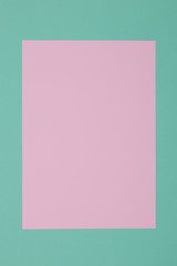 Blue, green and pink background, colored paper geometrically divides into zones, frame, copy, space.