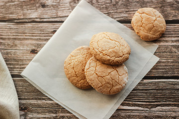 Almond cookies on the wood table. Romantic composition