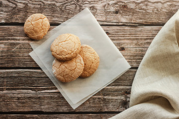 Almond cookies on the wood table. Romantic composition