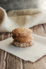 Almond cookies on the wood table. Romantic composition